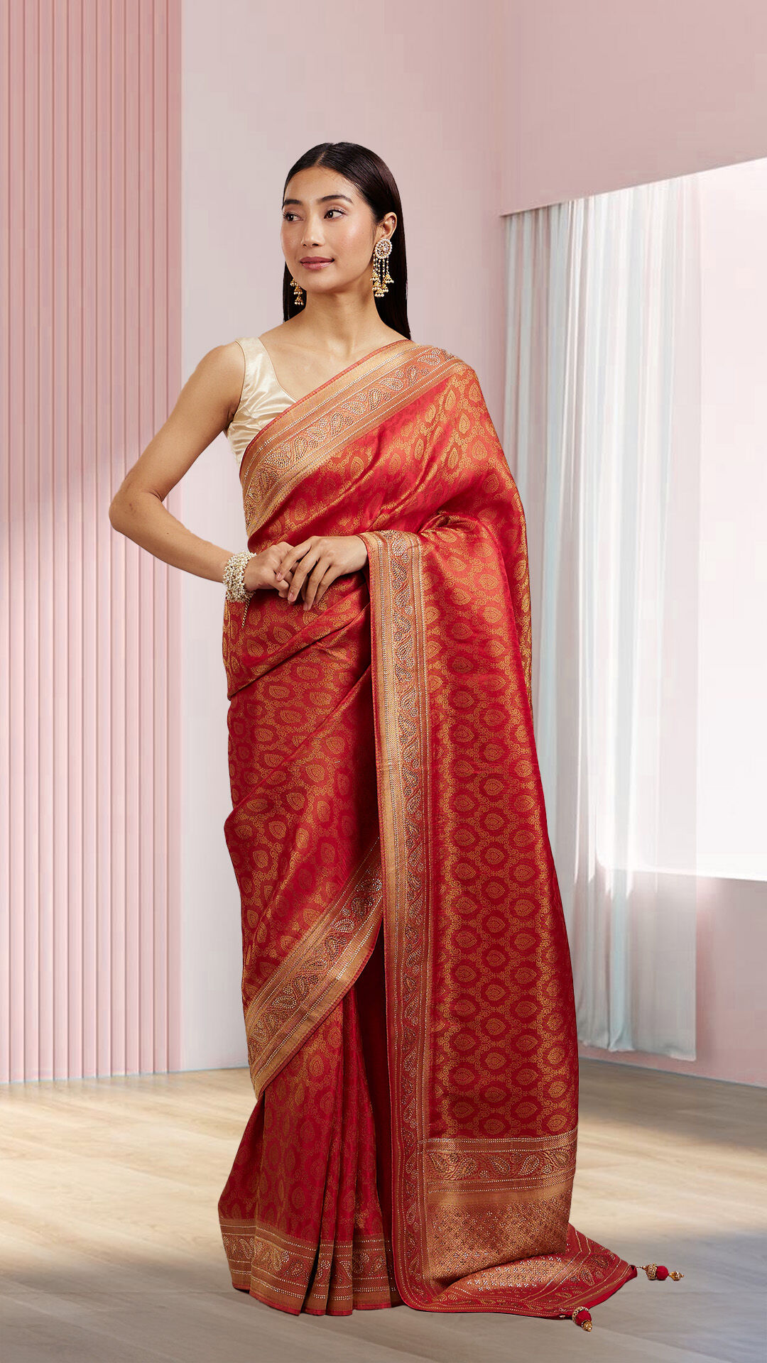 Bride flaunting her beautiful red saree with elegant bangles
